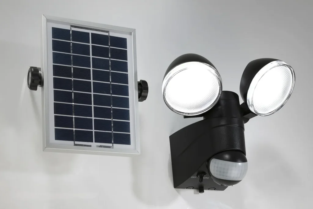 Duo spotlight with solar panel and motion detector