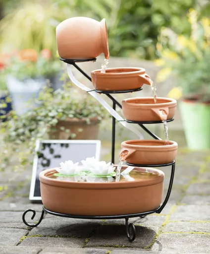 "Solar-powered cascade fountain image"