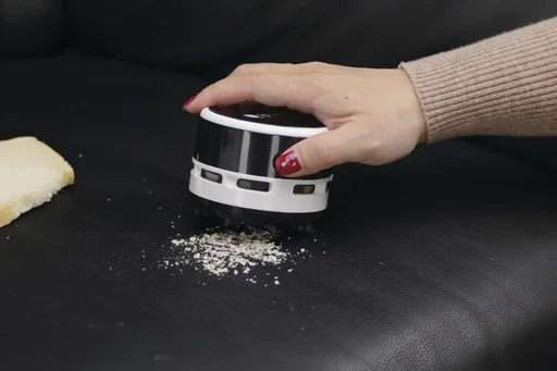 "Mini table vacuum cleaner, cordless, battery-operated image"
