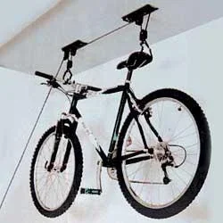 "Bicycle lift brings order to the basement and garage image"