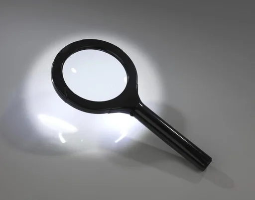 "Magnifying glass with 15 LEDs, black image"